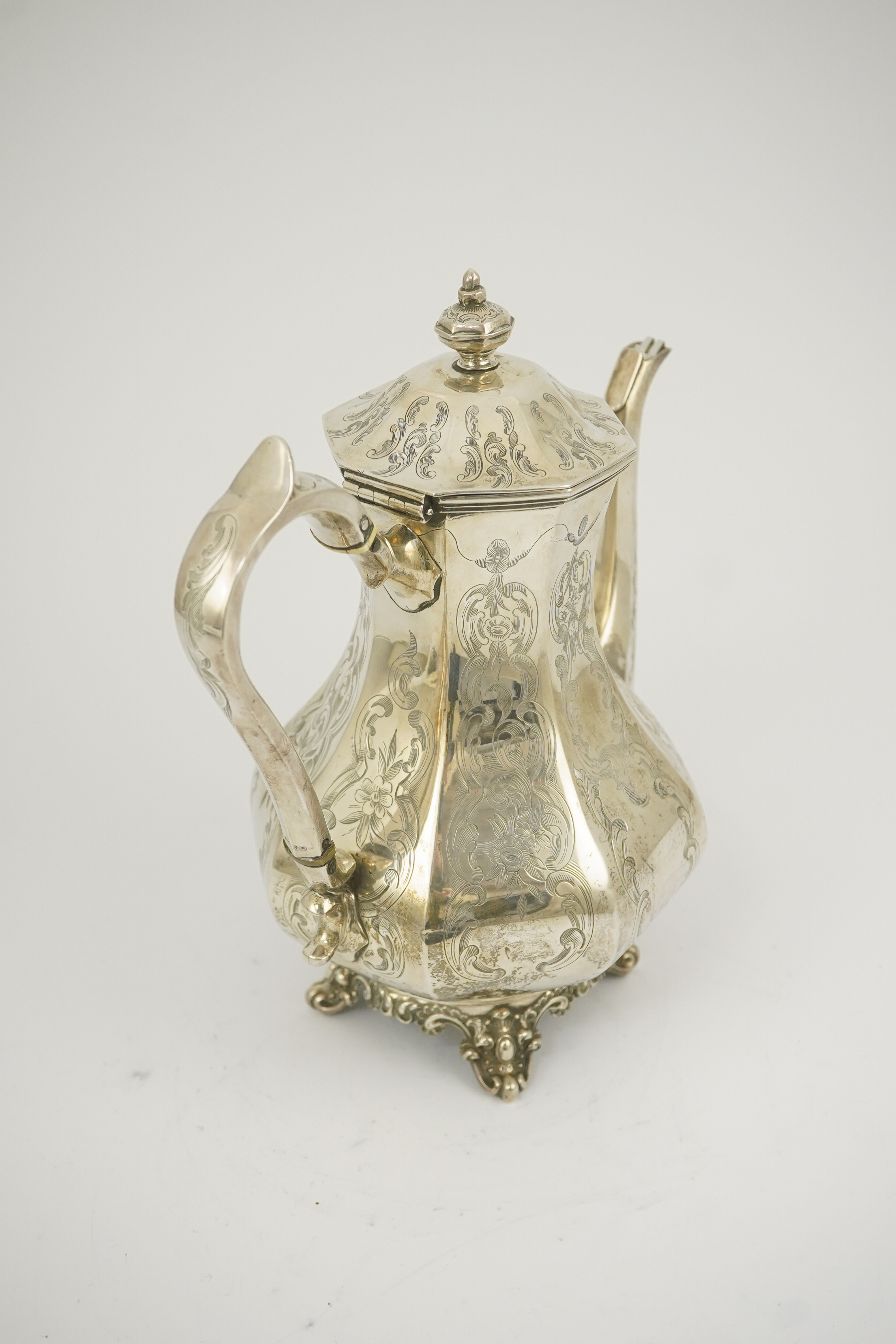 A Victorian engraved silver coffee pot, by John Welby